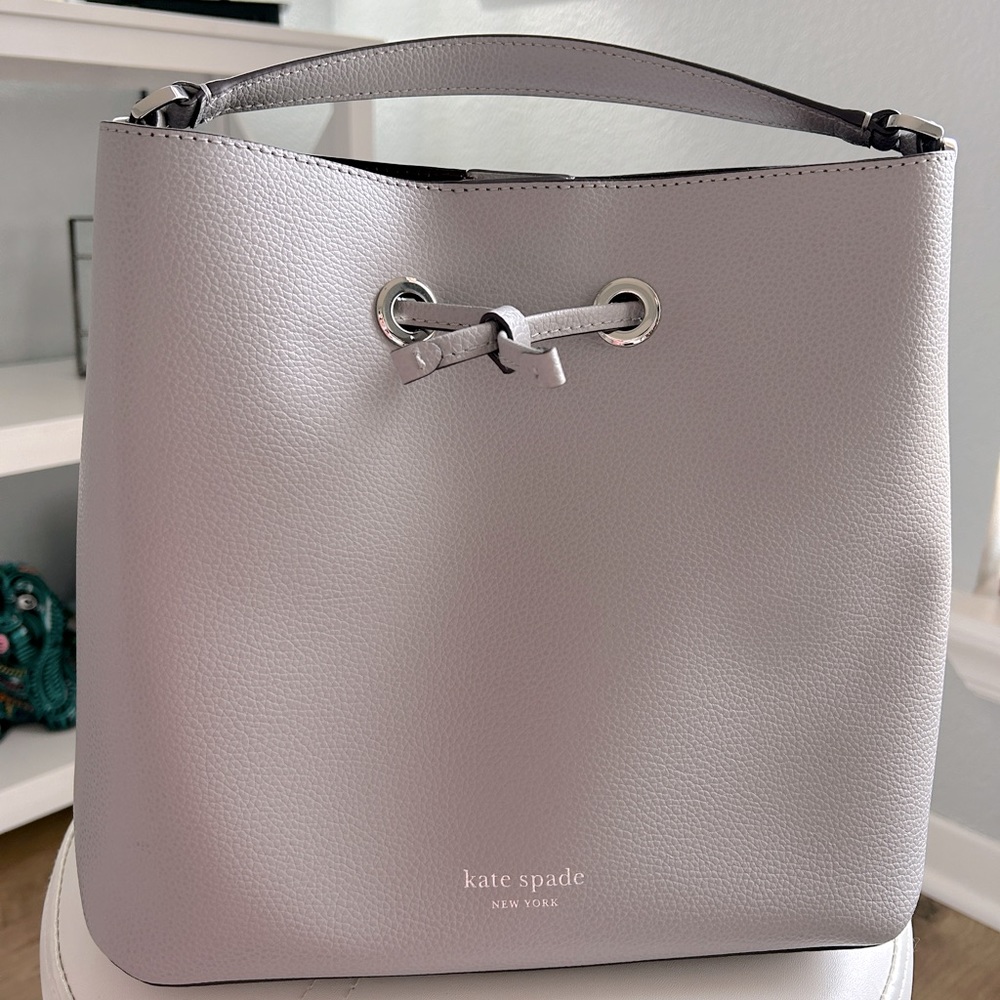 Light grey Kate Spade Bucket Bag with strap